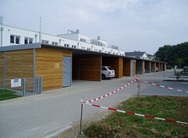 Carportanlage mit Stahlkonstruktion und Holzverkleidung der König GmbH